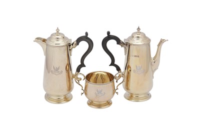 Lot 386 - An Edwardian sterling silver gilt three-piece café au lait set, London 1909 by Stewart Dawson & Co Ltd