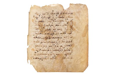 Lot 456 - A LOOSE FOLIO FROM A MAGHRIBI QUR'AN