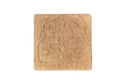 Lot 583 - A CARVED ALABASTER TILE WITH PARAKEETS