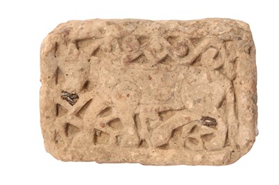 Lot 213 - AN EARTHENWARE POTTERY TILE FEATURING A COW