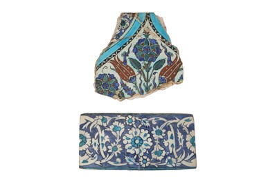 Lot 337 - TWO FRAGMENTARY IZNIK POTTERY TILES