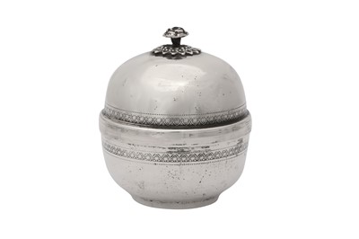 Lot 566 - A TURKISH SILVER LIDDED SUGAR BOWL WITH PARCEL-GILT INTERIOR