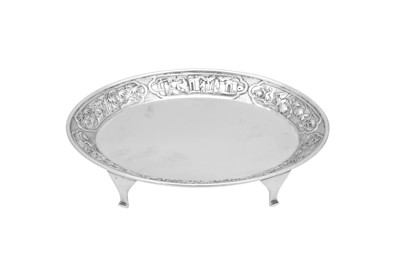 Lot 111 - A mid-19th century Chinese Export silver teapot stand, Canton circa 1860 retailed by Wang Hing