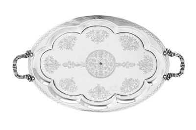 Lot 174 - A rare early 20th century Iraqi silver twin handled tray, Baghdad circa 1930 by Shuwa’ Jangana & Bros