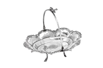 Lot 173 - An early 20th century Iraqi silver swing handled basket, Baghdad circa 1930, makers mark obscured