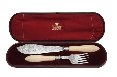 Lot 289 - A cased set of Victorian sterling silver and ivory fish servers, Sheffield 1882 by IAM gothic script (untraced)