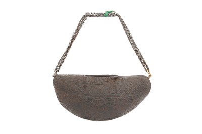 Lot 296 - A COCO-DE-MER BEGGING BOWL (KASHKUL)