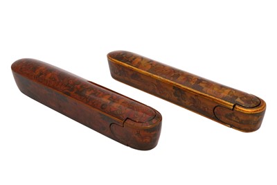 Lot 71 - TWO LACQUERED PAPIER-MÂCHÉ PEN CASES (QALAMDAN) WITH BATTLE SCENES