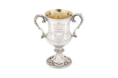Lot 57 - A third quarter 19th century Indian Colonial silver twin handled cup, Calcutta dated 1876 by Cooke and Kelvey