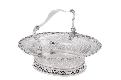 Lot 515 - A George II sterling silver cake basket, London 1740 by John Jacob (reg. 20th June 1739)