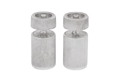 Lot 342 - A pair of Elizabeth II modernist sterling silver salt and pepper grinders, London 1998 by Gerald Benney (1930-2008)