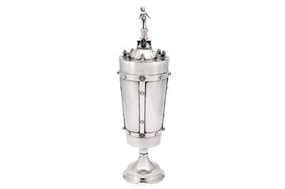 Lot 334 - A large George V ‘Arts and Crafts’ sterling silver and silver-plated cup and cover, London 1931 by Omar Ramsden (1873-1939)