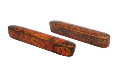 Lot 33 - TWO LACQUERED PAPIER-MÂCHÉ PEN CASES (QALAMDAN) WITH SCENES OF NUDES