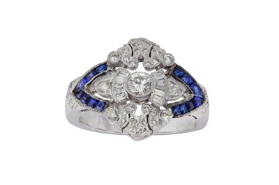Lot 39 - A diamond and sapphire dress ring