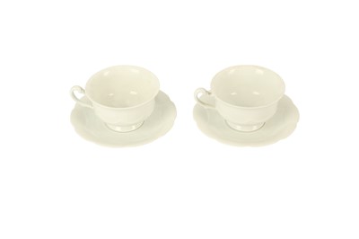 Lot 332 - A HUTSCHENREUTHER BAVARIA SET OF TWELVE CUPS AND SAUCERS