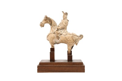 Lot 522 - A CHINESE POTTERY FIGURE OF A HORSE AND RIDER.