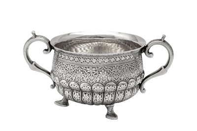 Lot 64 - A late 19th century Anglo – Indian unmarked silver twin handled sugar bowl, Kashmir circa 1880