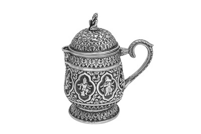 Lot 76 - A late 19th century Anglo – Indian unmarked silver covered milk jug, Madras circa 1890