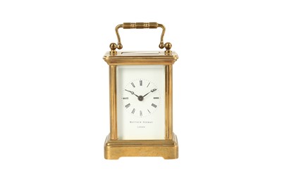 Lot 181 - A MINIATURE BRASS CARRIAGE CLOCK
