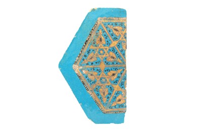 Lot 216 - A FRAGMENTARY TURQUOISE LAJVARDINA POTTERY TILE