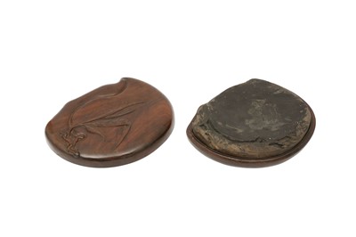 Lot 327 - A CHINESE EARTHENWARE ROOF TILE RE-PURPOSED AS AN INKSTONE.