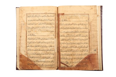 Lot 656 - A COLLECTION OF FIVE INCOMPLETE QUR'ANS