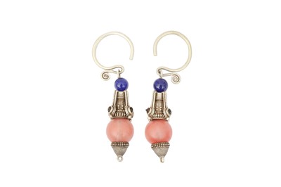 Lot 394 - A PAIR OF TIBETAN WHITE METAL EARRINGS.