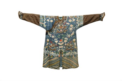Lot 374 - A CHINESE BLUE-GROUND SILK KESI WOVEN 'NINE DRAGON' ROBE, JIFU.