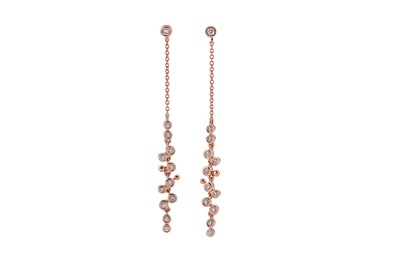 Lot 202 - A pair of diamond pendent earrings