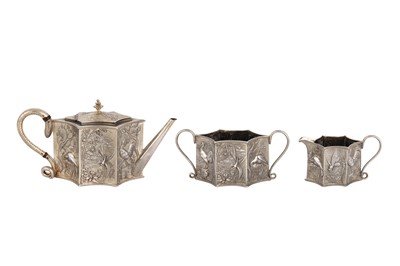Lot 562 - A Victorian Scottish parcel gilt sterling silver ‘aesthetic movement’ three-piece tea service, Edinburgh 1879 by Mackay, Cunningham and Co