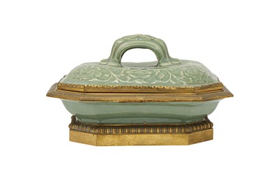 Lot 258 - A CHINESE CELADON-GLAZED GILT-MOUNTED TUREEN AND COVER.