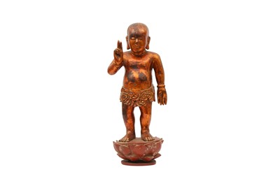 Lot 526 - A CHINESE GILT-LACQUER FIGURE OF THE INFANT BUDDHA.