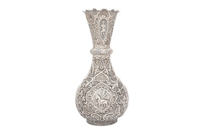Lot 302 - AN ARMENIAN REPOUSSÉ SILVER VASE WITH CHRISTIAN ICONOGRAPHY