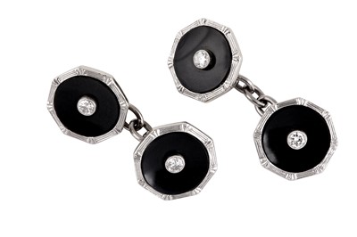 Lot 67 - A pair of onyx and diamond cufflinks
