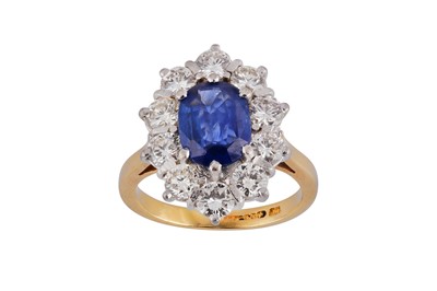 Lot 74 - A sapphire and diamond cluster ring