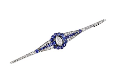 Lot 38 - A diamond and sapphire bar brooch