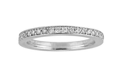 Lot 47 - A diamond half eternity ring