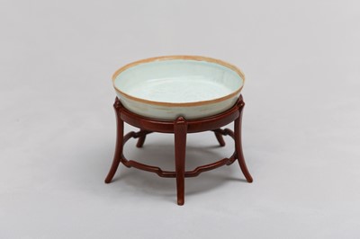 Lot 60 - A CHINESE QINGBAI SHALLOW 'PHOENIX' BOWL.
