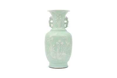 Lot 264 - A LARGE CHINESE SLIP-DECORATED CELADON-GLAZED VASE.