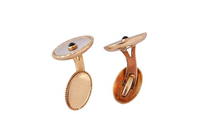 Lot 80 - A pair of mother of pearls and sapphire cufflinks