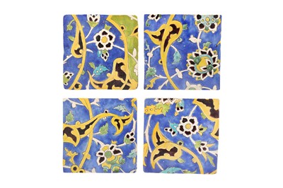 Lot 412 - FOUR SAFAVID CUERDA SECA POTTERY TILES WITH FLORAL SPRAYS