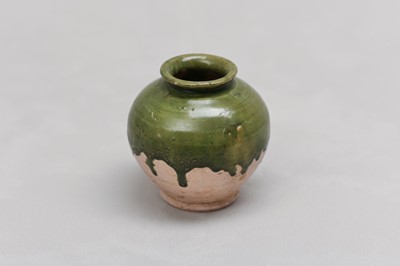 Lot 50 - A CHINESE GREEN-GLAZED JAR.
