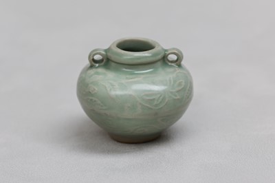 Lot 54 - A CHINESE CELADON-GLAZED JARLET.