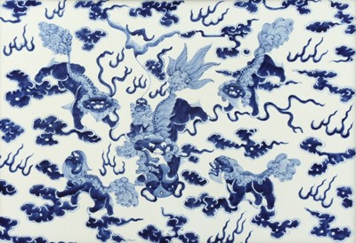 Lot 642 - A LARGE CHINESE BLUE AND WHITE 'BUDDHIST LION DOGS' PLAQUE.