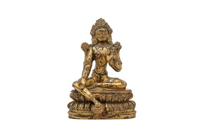 Lot 818 - A SINO-TIBETAN GILT-BRONZE FIGURE OF A GREEN TARA.