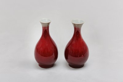 Lot 81 - A PAIR OF CHINESE COPPER RED-GLAZED VASES.