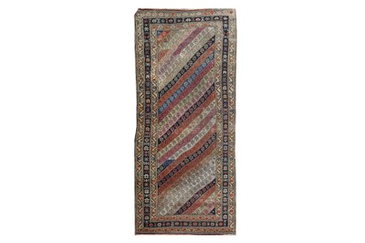 Lot 431 - AN ANTIQUE EAST CAUCASIAN LONG RUG