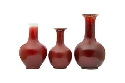 Lot 412 - THREE CHINESE SANG DE BOEUF-GLAZED VASES.