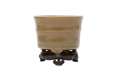 Lot 562 - A CHINESE CELADON-GLAZED INCENSE BURNER.