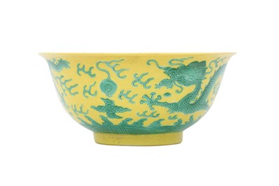 Lot 251 - A CHINESE YELLOW-GROUND 'DRAGON' BOWL.